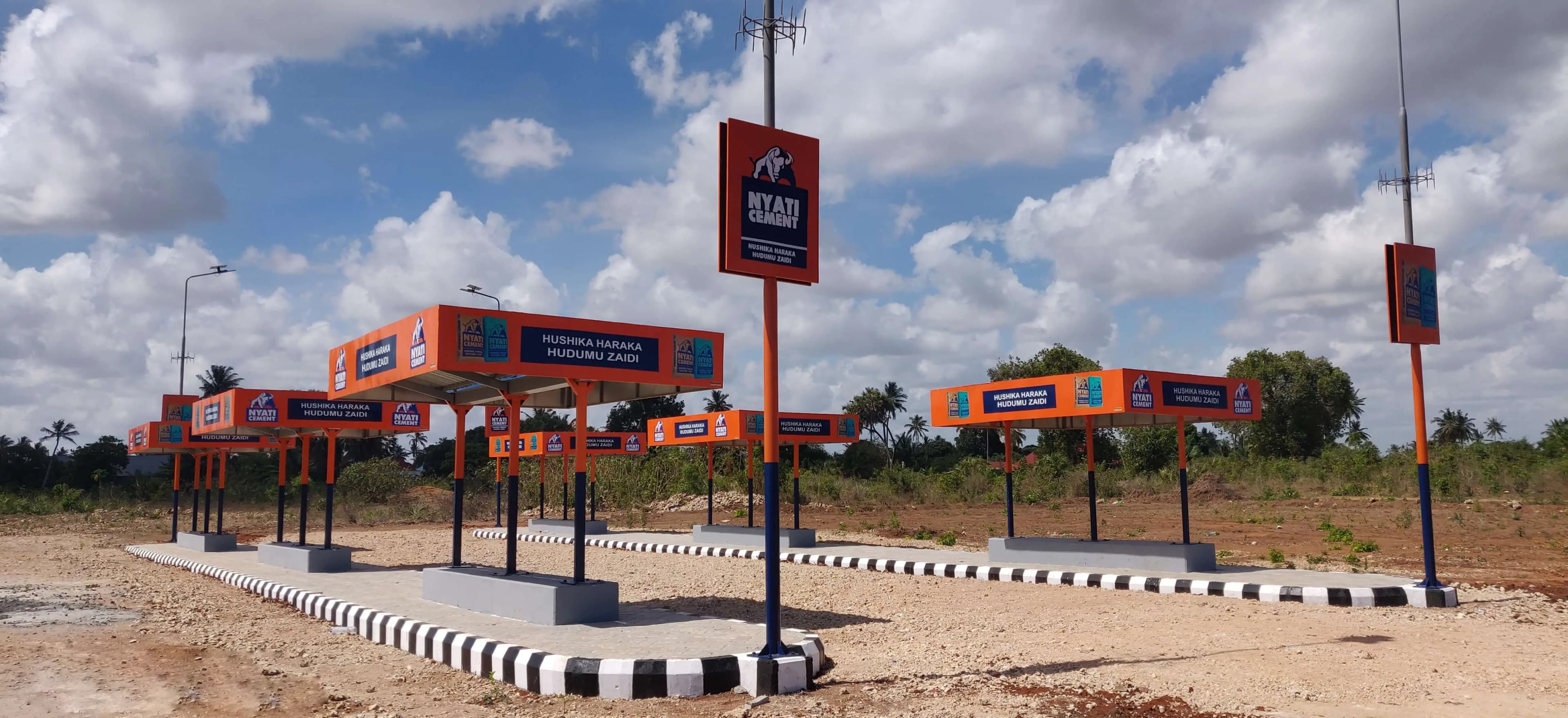 Nyati Cement Hands Over Geza Kigamboni Bus Terminal, Citizens Urged to Embrace Opportunities